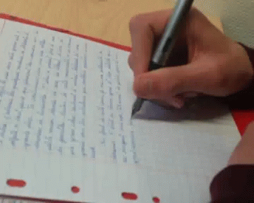 gif que mostra uma folha de caderno e uma mu00e3o escrevendo no papel com uma caneta